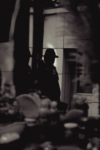 Photo by Feodor Chistyakov a man standing in front of a mirror in a room